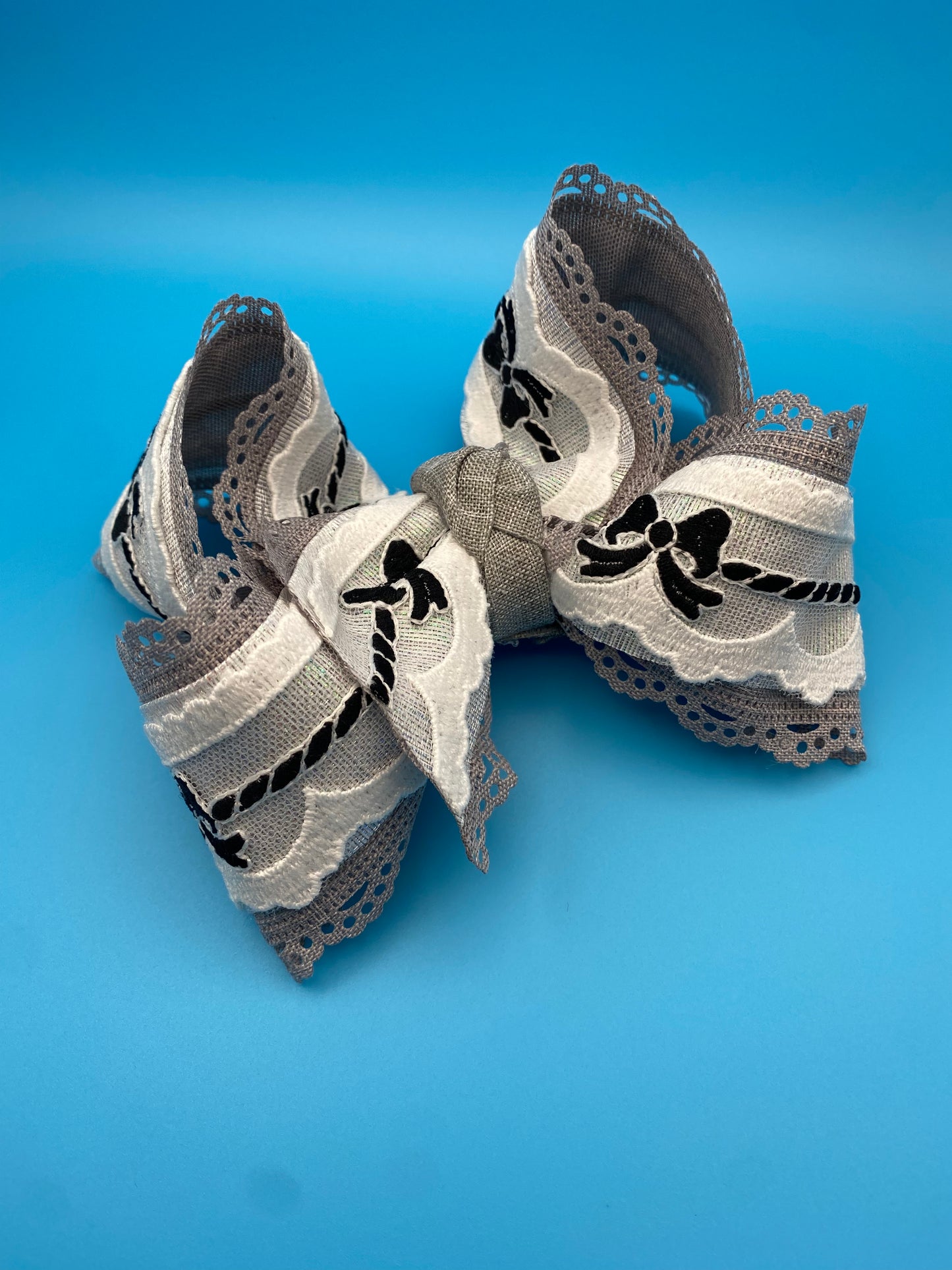 Grey Scalloped Black Bow Lace